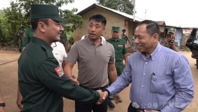 Lt.-Gen. Yar Pyae, right, meets UWSA officials in Panghsang on June 18 (Photo: UWSA)