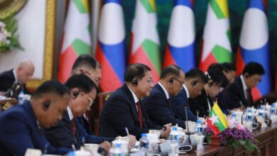 Myanmar junta chief Min Aung Hlaing attends a meeting with Lao President Thongloun Sisoulith at the Presidential Palace in Vientiane on July 3 (Photo: AFP)