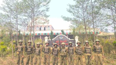 Junta troops pose in front of Surbung Airport in Chin State’s Falam Township shortly after capturing it in April (Photo: Junta propaganda)