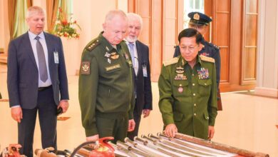Min Aung Hlaing and Russia’s deputy defence minister Col.-Gen. Aleksandr Fomin examine items allegedly used by resistance forces in 2021 (Photo: Myanmar state media)