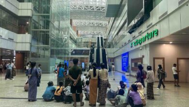 Family members saying goodbye to those departing for foreign countries at Yangon International Airport (Photo: Myanmar Now)